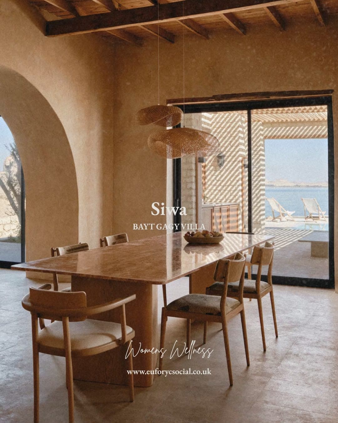 The marble dining table at Bayt Gagy Villa, looking out to the water