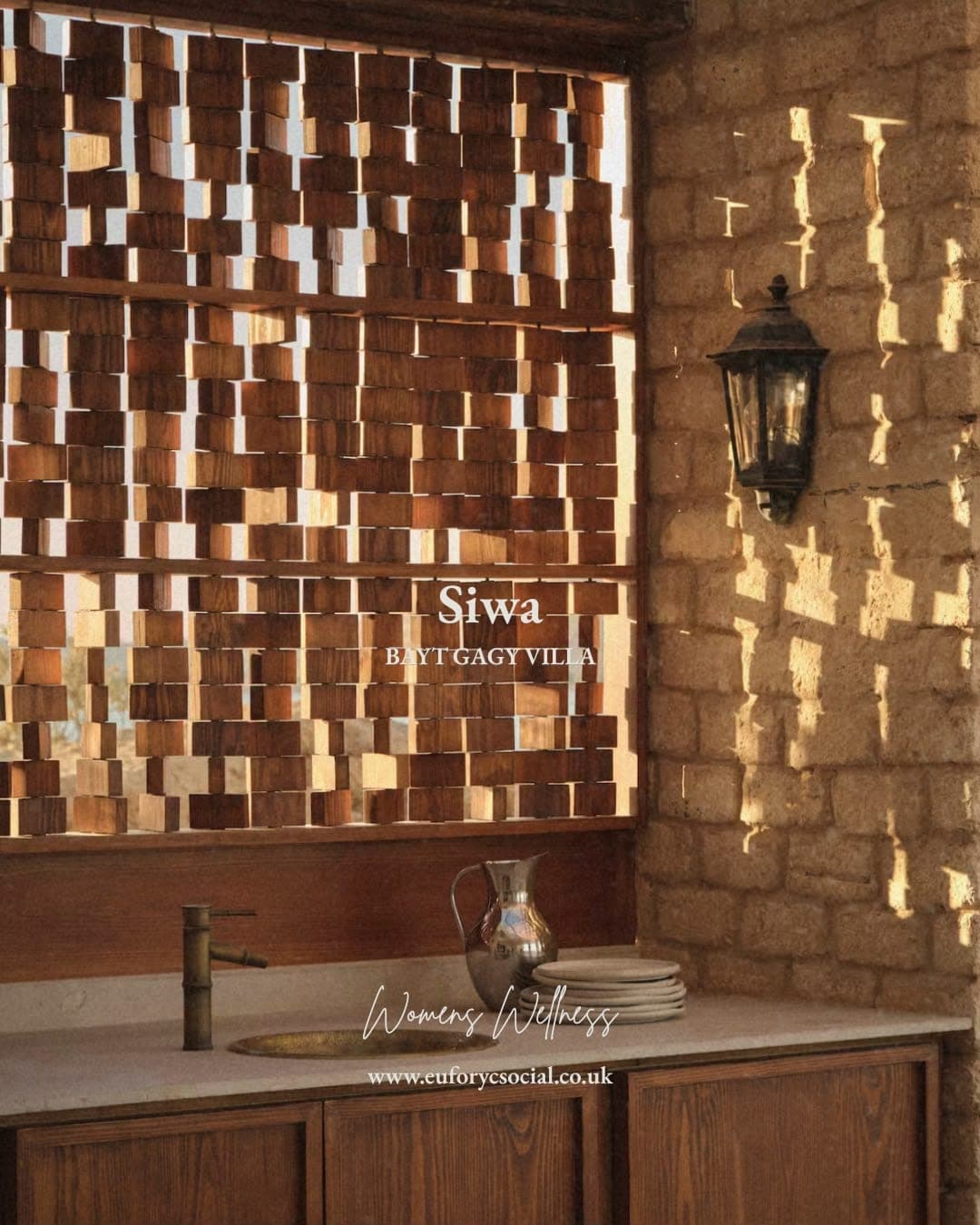 A timber mashrabiya screen at Bayt Gagy Villa, evening light through the blocks